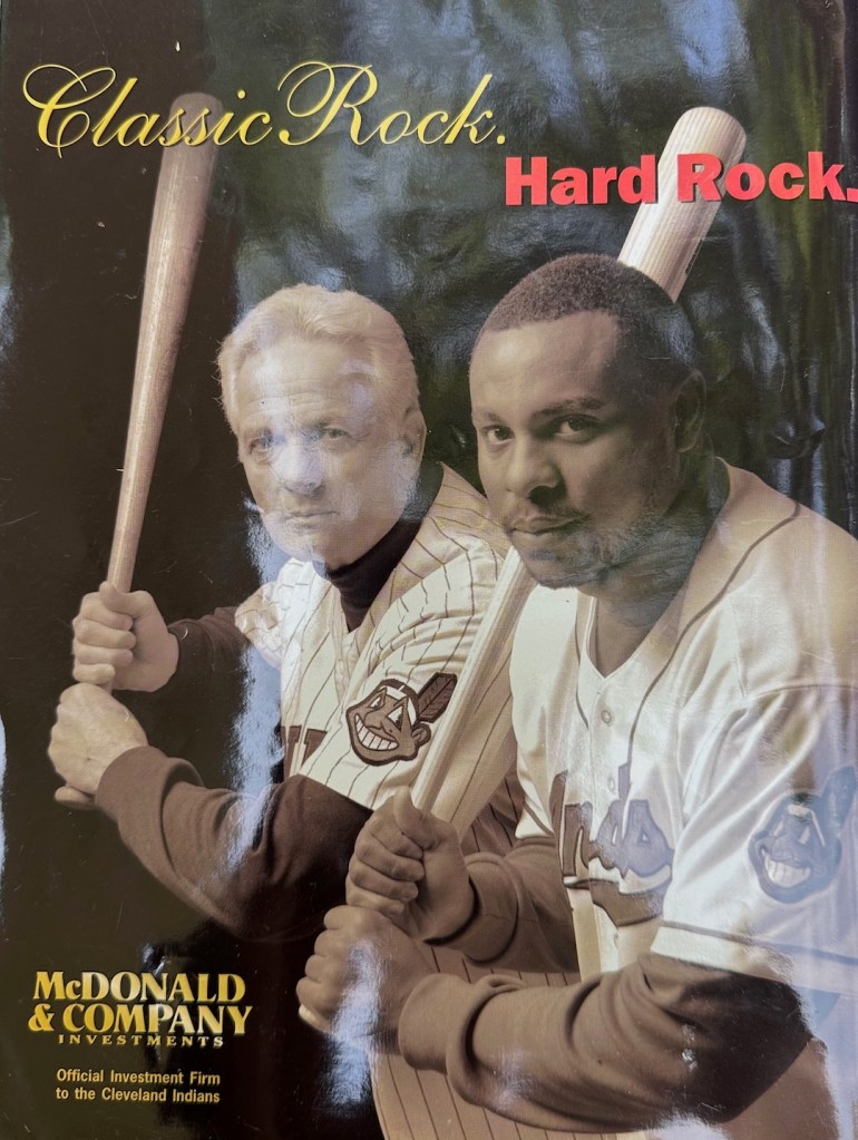 An image of the back cover ad, featuring Albert Belle with person (assuming owner, etc.) from McDonald & Company Investments, noted as the 'Official Investment Firm to the Cleveland Indians'.