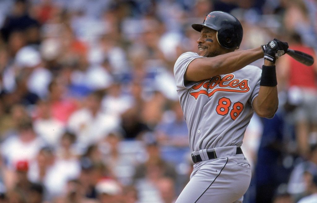 Albert Belle of the Baltimore Orioles swings at a pitch