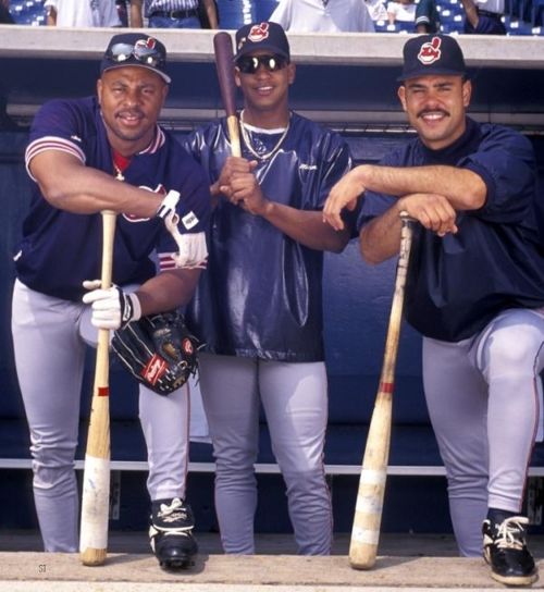 Albert Belle poses with Carlos Baerga and Manny Ramirez in the Cleveland Indians dugout.